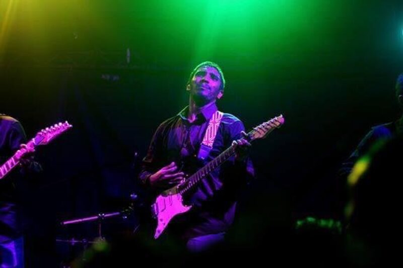 Bathed in green stage light